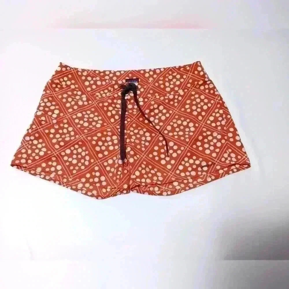 PATAGONIA Board Shorts Orange with white dot pattern. Side snap pocket. Size 6